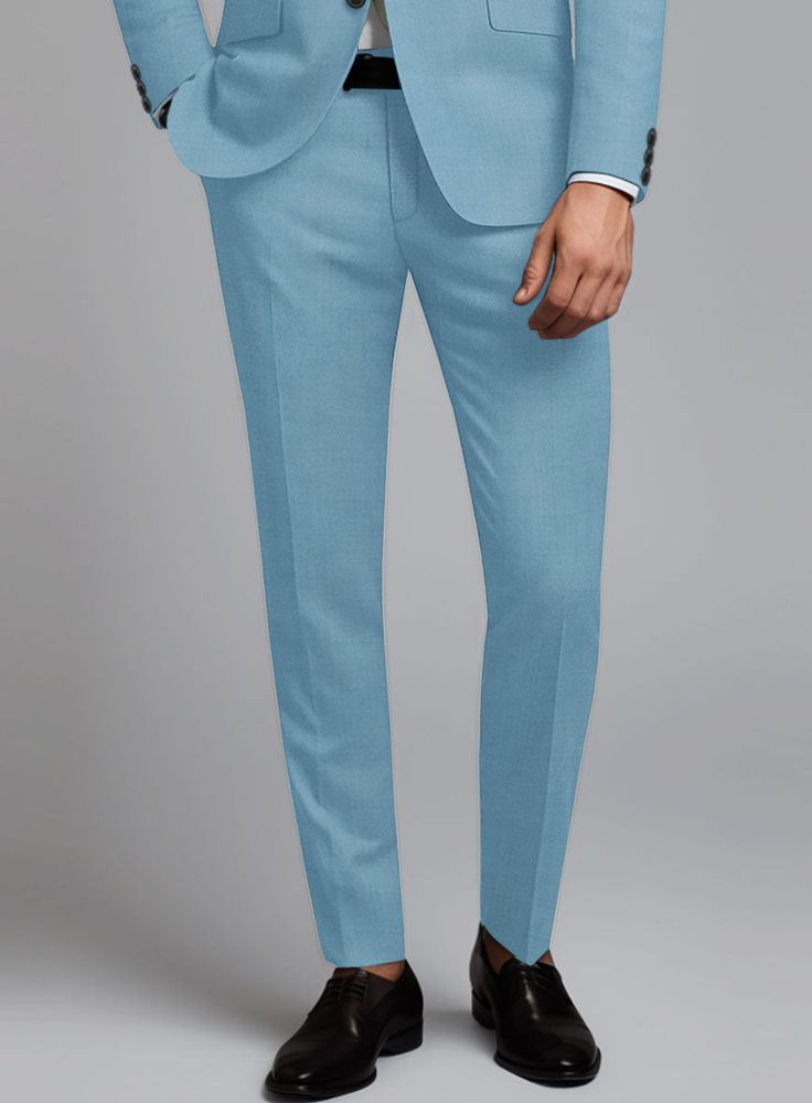 Give yourself a modish look with our Marco Stretch Pastel Blue Wool Suit. Meticulously fashioned from a wool blend, it boasts a delightful amount of stretch for that added touch of freedom. The pastel blue hue with a solid pattern offers a refreshing twist without veering into overly bold territory. Whether you're turning heads at a social gathering or aiming to infuse a dash of personality into your everyday style, this suit effortlessly takes center stage as your go-to chic upgrade.   Look Inc Blue Slim Fit Suit In Suiting Fabric, Blue Slim Fit Suits In Suiting Fabric, Blue Slim Fit Suits With Welt Pockets, Light Blue Notch Lapel Suit For Spring, Blue Fitted Suit With Notch Lapel, Light Blue Slim Fit Business Suit, Blue Business Suit For Spring, Tailored Light Blue Suit With Notch Lapel, Light Blue Tailored Suit With Notch Lapel