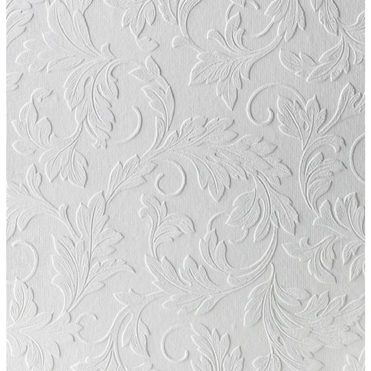 white wallpaper with an intricate design on it's surface and the background is painted in