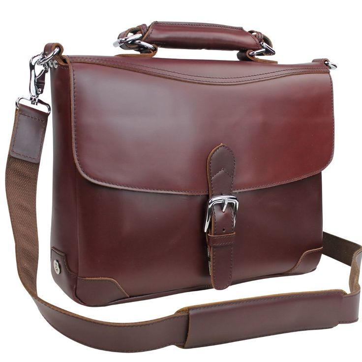 a brown leather briefcase with two straps on the bottom and one strap hanging down to the side