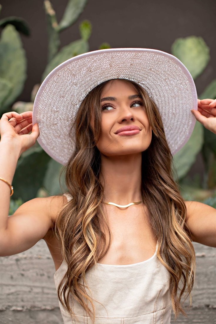 Our Palm Desert Panama fit in perfectly on our latest road trip photo shoot. Stunning, classic, chic - everything you've ever wanted in a hat. Featuring a molded crown with a pinched 10cm brim and hand woven straw, it's crystallized on the tone on tone ribbon with a simple Swarovski rivet. -Rancher style hat with a chill & casual vibe-Brim is flexible but holds its shape-Coordinating ribbon band-Pinched top-Great quality-- will last forever-This color actually goes with everything effortless Beach Boater Hat With Structured Crown, Vacation Hat With Structured Crown, Structured Crown Straw Hat For Summer, Straw Hat With Structured Crown For Vacation, Straw Hat With Structured Crown For Beach, Structured Crown Toquilla Straw Hat For Summer, Summer Straw Hat With Structured Crown, Structured Crown Straw Panama Hat For Beach, Vacation Straw Hat With Structured Crown