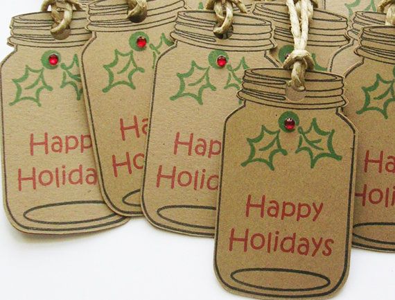 four tags with happy holidays written on them