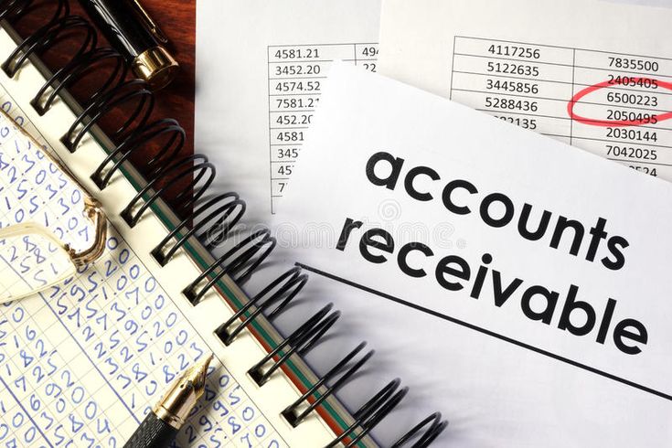 a close up of a notepad with the words accounts receivable on it