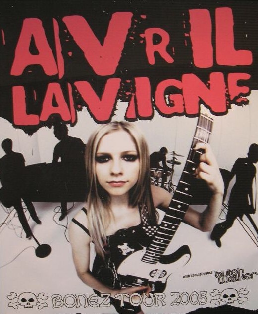 an advertisement for a band called avril lavigne featuring a woman holding a guitar