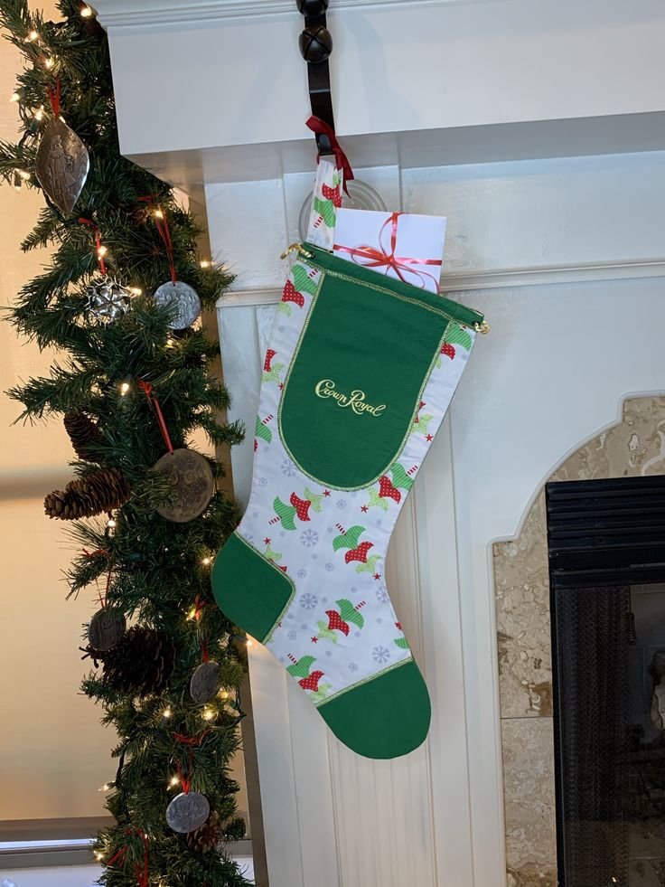 a christmas stocking hanging from a fireplace