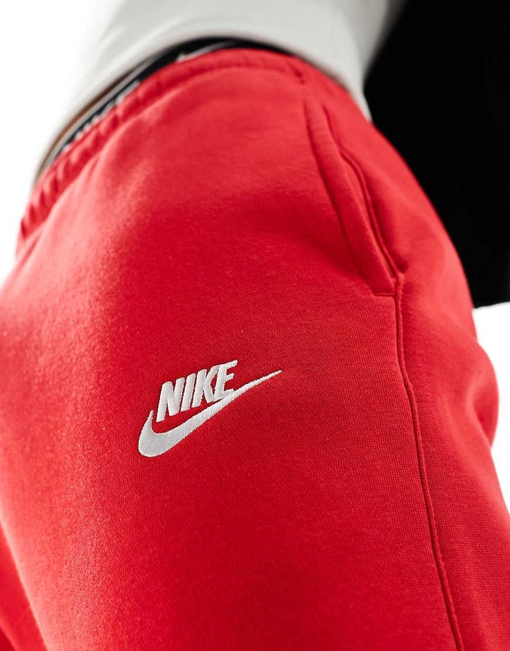 Joggers by Nike Can't go wrong in sweats Elasticized waistband Functional pockets Logo embroidery Fitted cuffs Regular, tapered fit Nike Cotton Sweatpants With Ribbed Cuffs, Nike Jogging Pants With Ribbed Cuffs, Nike Sweatpants With Ribbed Cuffs For Jogging, Nike Pants With Ribbed Cuffs For Jogging, Nike Joggers With Ribbed Waistband For Streetwear, Red Joggers With Pockets For Jogging, Red Relaxed Fit Sporty Sweatpants, Sporty Red Sweatpants With Elastic Waistband, Sporty Red Cotton Sweatpants