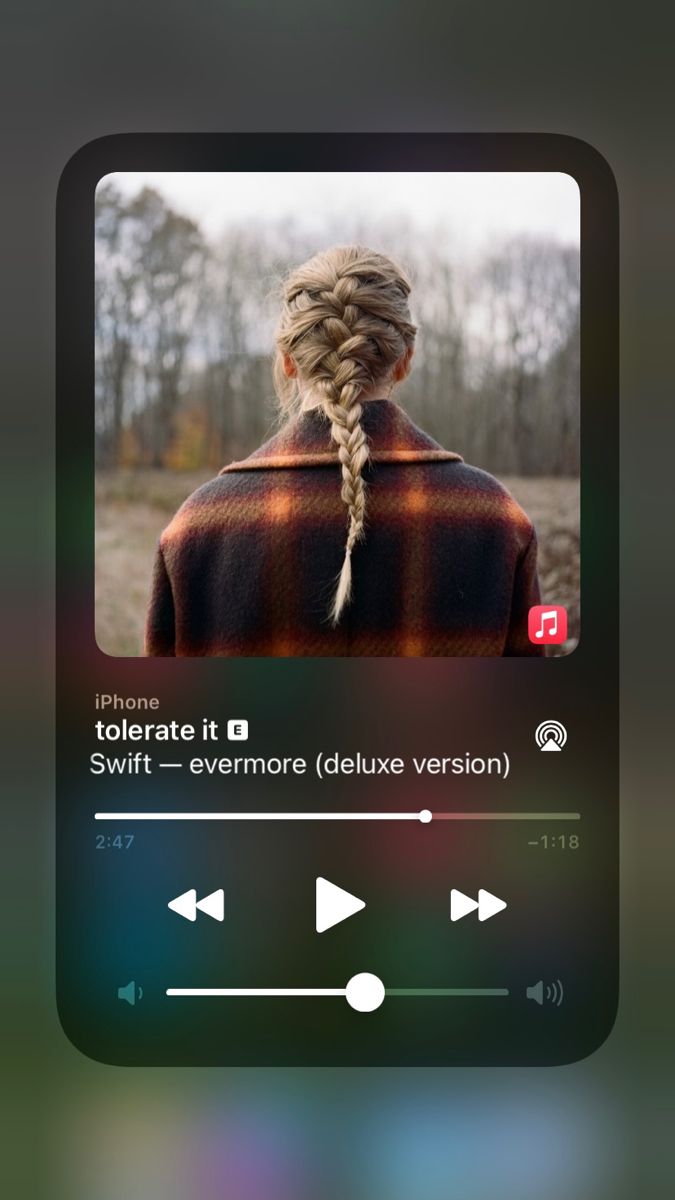 an iphone screen showing the music player for taylor swift's album, where she is recording