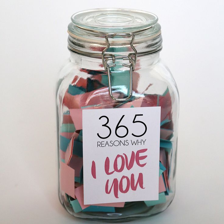 a glass jar filled with lots of colorful paper hearts and a tag that says 365 reasons why i love you