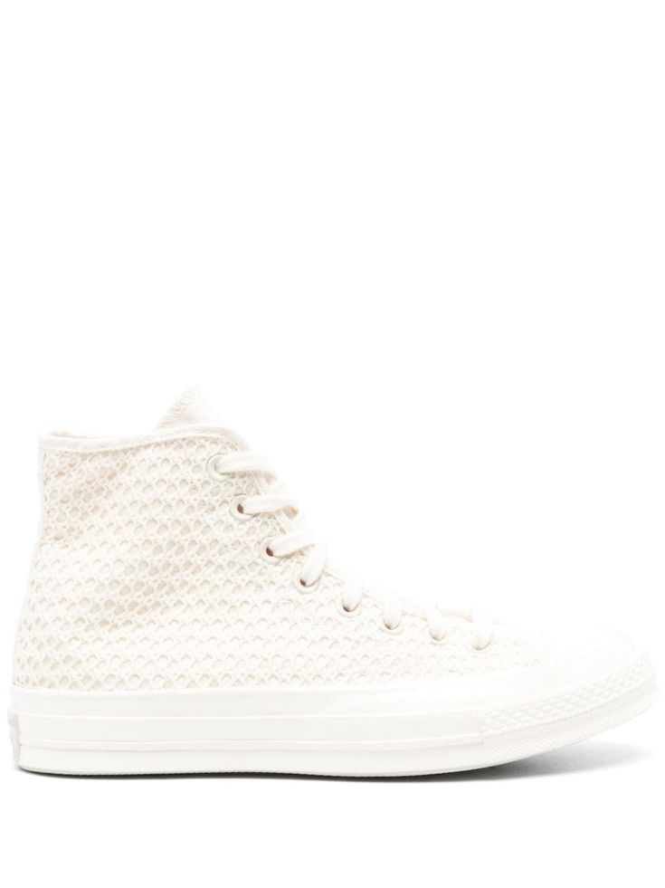 ecru open knit signature Chuck Taylor patch eyelet detailing rubber toecap round toe front lace-up fastening branded insole flat rubber sole ankle-length We've partnered with Good On You — an independent agency that rates how brands perform in relation to their impact on the planet, people and animals, with a multi-criteria rating simplified to a five points scale. In order to be awarded our conscious label, larger brands need to score a minimum of four out of five ('Good'), while smaller brands must score at least three out of five ('It's A Start'). This item comes from a brand rated three out of five ('It's A Start') by Good on You at the time it was added on FARFETCH. Please note, this is a brand-level rating and does not guarantee that this product is made with conscious materials. Lea Converse Chuck 70 High Top, Planet People, Balenciaga Track, Converse Chuck 70, Five Points, Chuck 70, Brown Sneakers, Balenciaga Triple S, Sneakers Grey