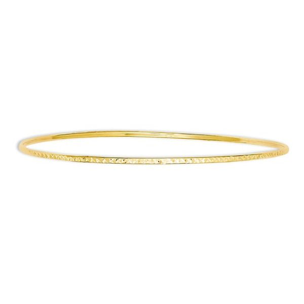 Delicate and refined, this bangle bracelet is a timeless treasure. Crafted in warm 14K gold, this sleek design is enhanced with diamond-cut detailing that offers maximum sparkle potential. She's certain to adore this classic bangle. Polished to a bright shine, this 8.0-inch circumference bracelet slips on and off for easy anytime wear. Classic Hammered Yellow Gold Bracelets, Hammered Yellow Gold Bangle, Luxury Hammered Yellow Gold Bangle, Hammered Yellow Gold Bangle Bracelet, Dainty 14k Gold Bangle For Formal Occasions, Elegant 14k Gold Hammered Bracelet, Formal Yellow Gold Hammered Bangle, Flexible Yellow Gold Bracelet For Anniversary, Yellow Gold Hoop Bracelet For Anniversary