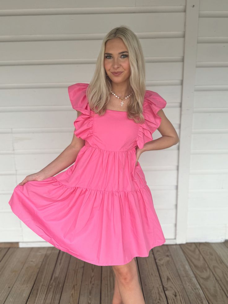 Adorable flowy pink babydoll dress with ruffle sleeves. Model is 5'4" with a 25" waist, 32" bust, and 32" hips wearing a small. Pink Flirty Ruffle Dress For Day Out, Flirty Pink Ruffle Dress For Spring, Pink Flowy Tiered Dress With Ruffles, Flirty Pink Ruffle Dress For Day Out, Flowy Pink Tiered Dress With Ruffles, Pink Mini Tiered Ruffled Dress, Pink Ruffled Mini Length Tiered Dress, Pink Flirty Mini Ruffle Dress, Pink Mini Tiered Dress With Ruffled Skirt