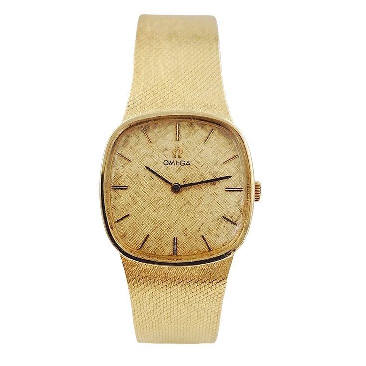 1970's Unisex Omega 29mm Vintage 14K Yellow Gold Watch with Textured Champagne Dial. Pre-Owned Brand: Omega. Gender: Unisex. Case Back: Solid. Case Size: 29mm. Crystal: Sapphire. Band Type: Bracelet. Condition: Very Good. Hands: 14K Yellow Gold. Dial Color: Champagne. Watch Label: Swiss Made. Case Shape: Semi Square. Total Weight: 54.9 Grams. Case Material: 14K Yellow Gold. Band Material: 14K Yellow Gold. Bezel Material: 14K Yellow Gold. Movement: Self-Winding (Automatic). Bracelet Size: Fit 7.7 Retro Yellow Gold Watches For Formal Occasions, Retro Yellow Gold Formal Watch, New Rolex, Sapphire Band, Color Champagne, Watch Movement, Swiss Made, Gold Band, Watch Brands