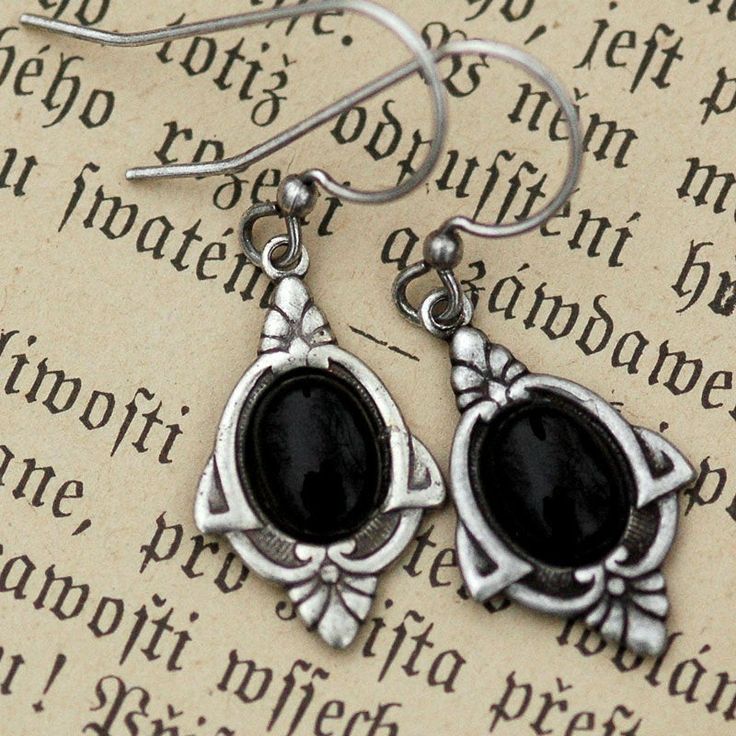 8x6mm black onyx stones in Art Deco detailed setting pendants measuring 21mm tall. Both the settings and hooks are oxidized sterling silver plated brass. Huge Pearl Necklace, Vintage Style Art, Stone Dangle Earrings, Big Pearl, Black Onyx Stone, Onyx Earrings, Onyx Stone, Oxidized Sterling Silver, Beaded Choker