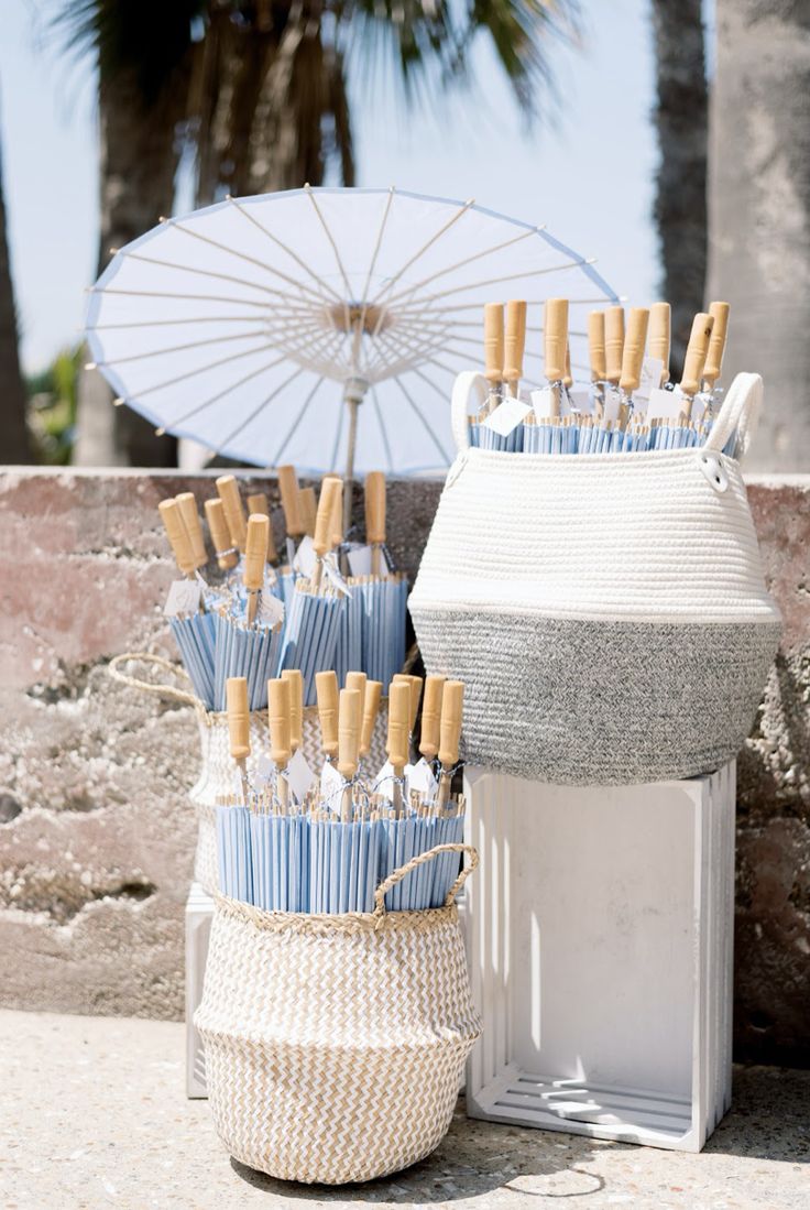 an umbrella and some bottles on the ground