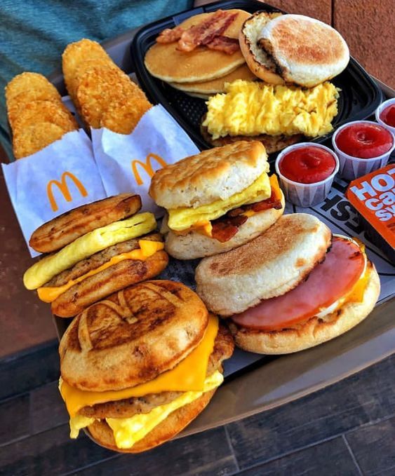 an assortment of breakfast foods on a tray