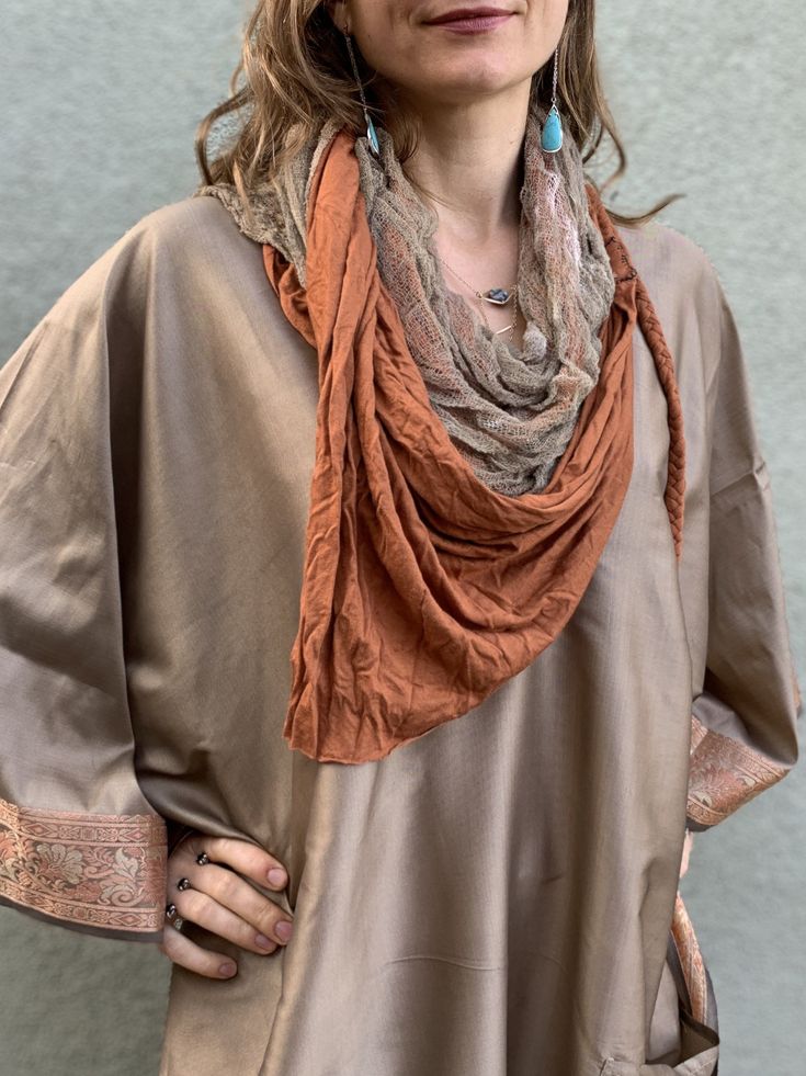 This beautiful desert shawl is a one of the kind creation. It can be worn as a headpiece, a belt, a scarf or a wrap. It comes with two detachable layers: a gauze cotton, hand-dyed by Lunara Love herself, and a stretch cotton jersey layer. This gorgeous beduin style desert scarf is lovingly hand crafted by Lunara Love of Lunara Design for our collaborative collection "Nomad Life" Being a nomad is like being a free spirit, a desert dweller who is ready to let go of the things that don't really mat Beige Scarf, Brown Scarves, Flowing Dresses, Fashion Capsule, Free Spirit, Stretch Cotton, Warm Weather, Headpiece, Hand Dyeing