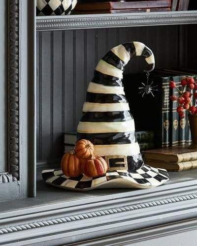 a book shelf filled with books and decorations