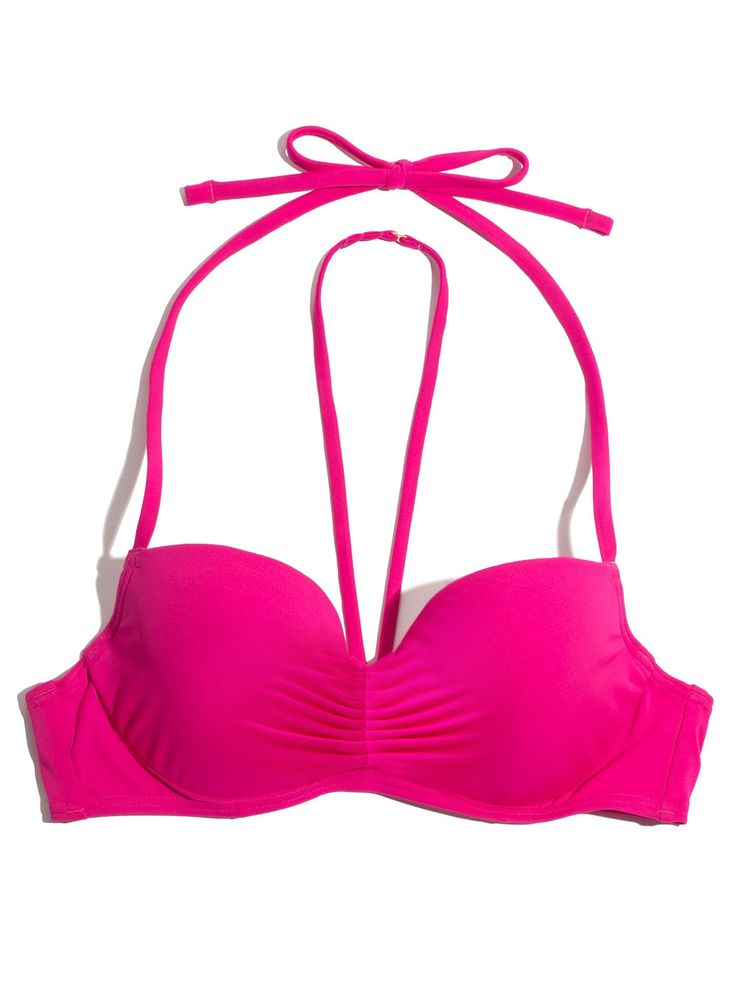 Swim Secret Halter Bikini Top SA1001 Accentuate your curves in the Smart&Sexy Swim Secret Halter Bikini Top. The bikini top that's just as sexy as it is supportive. Designed to flatter every shape, lightly lined cups and encased underwire support give you the same comfortable, natural lift as your favorite Smart&Sexy bra. The removable center strap gives this halter top bikini a bold look, with multiple ways to style. Mix and match with our Swim Secret bikini bottoms to create a beach look you c Pink T-back Swimwear With Built-in Bra, Pink Padded Swimwear For Sunbathing, Beach Push-up Bra, Solid Color Push-up Bra For Beach, Beach Push-up Bra In Solid Color, Pink Seamless Triangle Halter Top, Pink Bandeau Halter Top For Pool, Pink Padded Swimwear For Beach Season, Padded Pink Swimwear For Beach Season