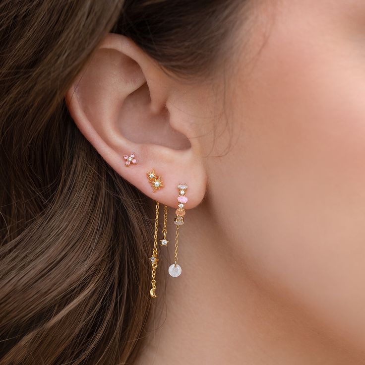 Introducing our enchanting Starry Night Dangle Earrings. With a charming 2-star stud and a dangle backing adorned with celestial detailing, this piece will have you shining as bright as the evening sky. In a beautiful fusion of dreamy design and twinkling elegance, our Starry Night Dangle Earrings will be a piece you'l Dainty Chain Earrings, Dainty Star Charm Drop Earrings, Celestial Style Drop Earrings With Dangling Charms, Elegant Star-shaped Jewelry With Dangling Charms, Minimalist Ear Piercings, Dreamy Design, Earrings Outfit, Ear Art, Double Earrings