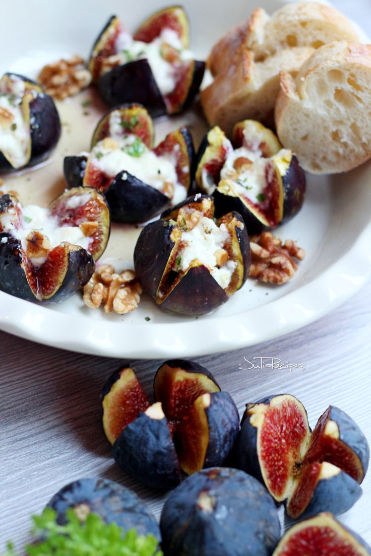 figs with cheese and nuts on a white plate