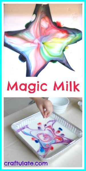 a child is painting on a paper plate with the words magic milk