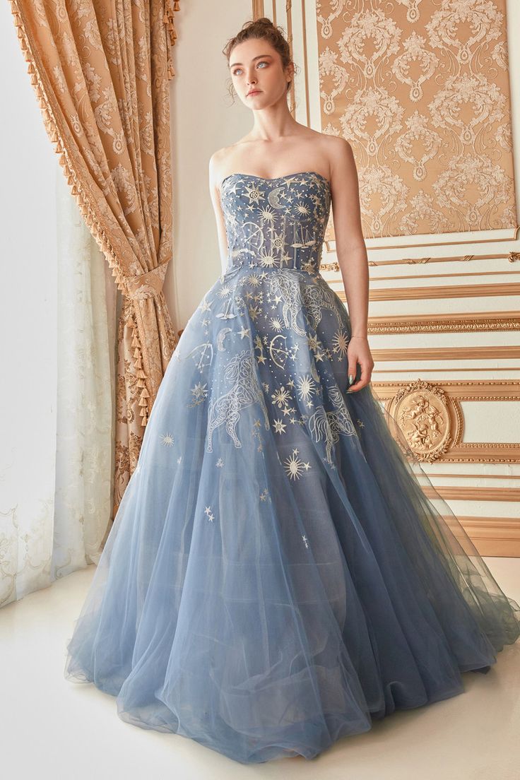 Fall in love with this star studded celestial piece. Shine bright as the constellations that are embedded within the gown. This gown features a strapless bodice with structured panels and cinches at the waist and flares into layers of the tulle.✨ Constellation Dress, Andrea And Leo, The Constellations, Tulle Balls, Constellation Print, Prom Ball Gown, Tulle Ball Gown, Corset Lace, Wholesale Dress