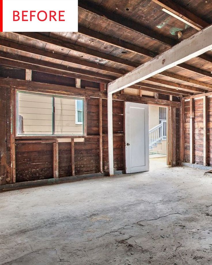 an empty room with wood paneling and white door in the center, before and after remodel