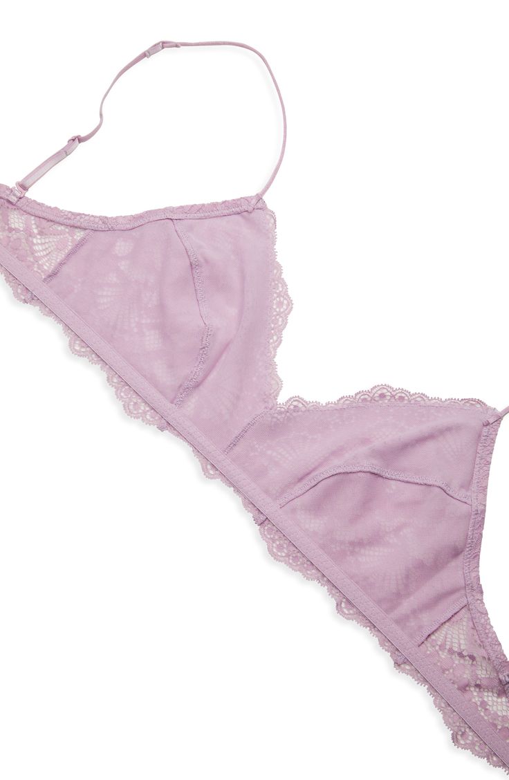 Intricate lace lends romantic charm to this pretty bralette designed with a dipped neckline and slinky adjustable straps. Adjustable straps Mesh lined cups 89% nylon, 11% elastane Hand wash, dry flat Imported Women's Clothing Bralette, Lilac, Adjustable Straps, Women's Clothing, Free People, Flash, Hand Wash, Nordstrom, Mesh