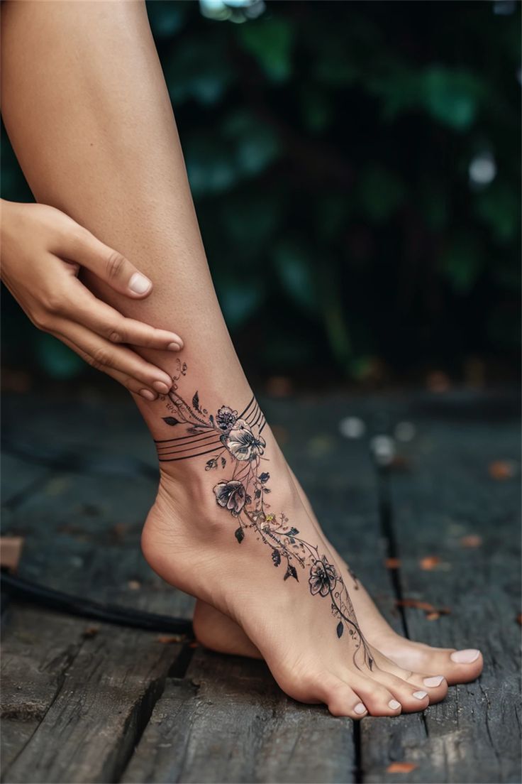 Discover the beauty of ankle tattoos for women with our curated collection of small and meaningful designs. From pretty floral motifs to unique symbols, these tattoos can be both classy and cute. Ankle tattoos offer a perfect canvas for showcasing your individuality, whether you prefer a delicate design or something bold. Explore ideas that range from small accents to stunning illustrations, and find the perfect tattoo that resonates with your style. Ankle Tattoo Ideas Female, Ankle To Foot Tattoos For Women, Dragon Ankle Tattoo Wrap Around, Delicate Foot Tattoos For Women, Women’s Ankle Tattoo, Pretty Ankle Tattoos For Women, Be Where Your Feet Are Tattoo, Ankle Tatoos Woman, Feminine Forearm Tattoos For Women