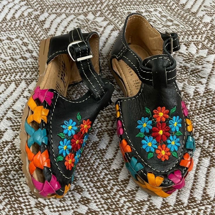 Authentic Mexican Leather Huaraches ! New - No Tags - Colorful Embroidery! Mexican Shoes ! Great Quality! Length Measurements: Size 4us / 12 Centimeters. Size 5us / 13 Centimeters. Size 6us / 14 Centimeters. Size 7us / 15 Centimeters. Size 8us / 16 Centimeters. Size 9us / 17 Centimeters. Size 10us / 18 Centimeters. Size 11us / 19 Centimeters. Size 12us / 20 Centimeters. Size 13us / 21 Centimeters. Black Handmade Round Toe Sandals, Handmade Black Sandals With Round Toe, Handmade Black Round Toe Sandals, Fun Black Sandals With Round Toe, Black Round Toe Sandals With Fun Style, Black Huaraches For Spring Festival, Black Sandals With Soft Sole And Round Toe, Handmade Black Sandals For Spring, Casual Black Huarache Sandals For Spring