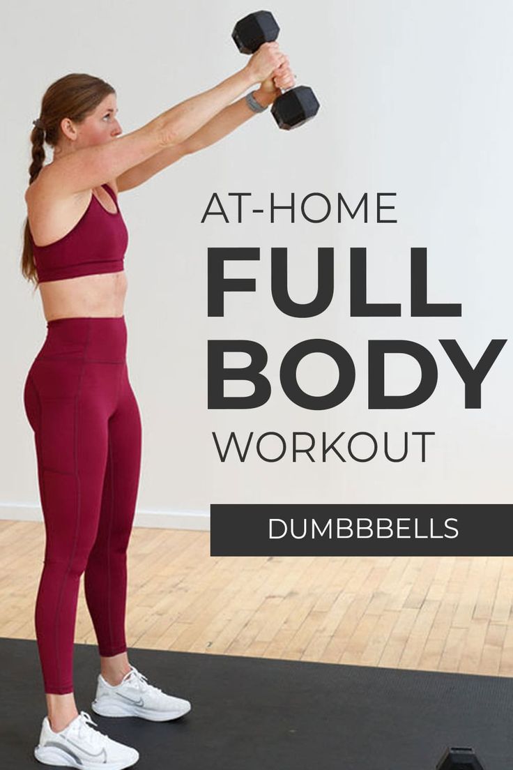 a woman doing dumbbells with the words at - home full body workout on it