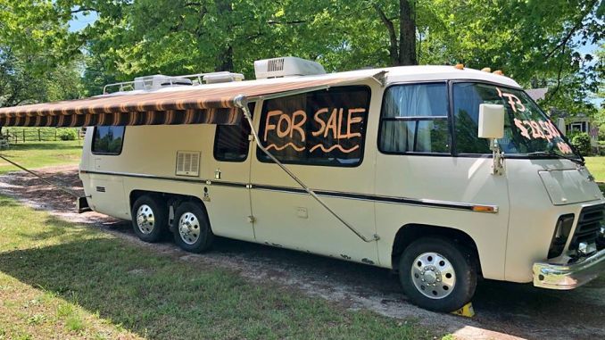 an old camper van with a for sale sign on it