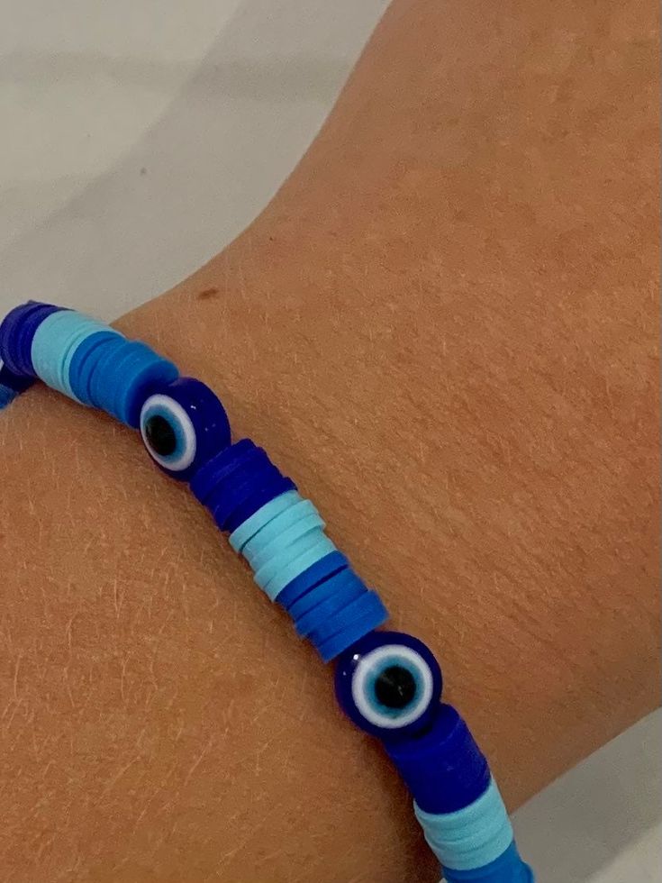 A super cute and stylish evil eye bracelet! Pulls together any outfit and takes your accessory game to a new whole level<3 Trendy Resizable Evil Eye Bracelet, Trendy Adjustable Evil Eye Friendship Bracelets, Handmade Casual Evil Eye Bracelet, Casual Evil Eye Bracelets, Casual Blue Friendship Bracelets With Evil Eye, Handmade Blue Evil Eye Bracelet Casual Style, Trendy Multicolor Evil Eye Bracelet For Friendship, Trendy Evil Eye Bracelet For Friendship, Trendy Evil Eye Jewelry For Friendship