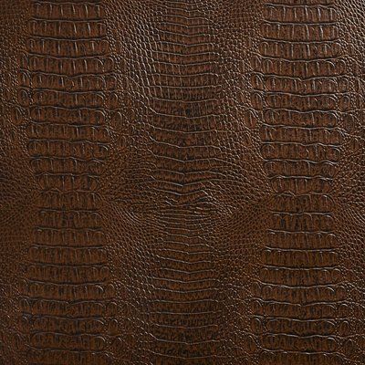 a brown leather textured background or wallpaper that looks like it has been made out of