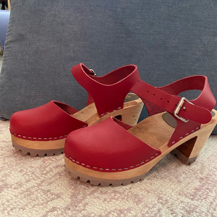 Mia Abba Clogs. New Without Tags, Never Worn. Size 36 (Us 6). Made In Sweden. Beautiful Red Leather Upper, Wood Footbed/Heel. Red Heels Clogs & Mules, Red High Heel Mules With Wooden Heel, Spring Red Clogs With Wooden Heel, Red Leather Platform Clogs, Red High Heel Casual Clogs, Red Leather Open Heel Clogs, Casual Red High Heel Clogs, Casual Red Closed Toe Clogs, Red Summer Clogs With Wooden Heel