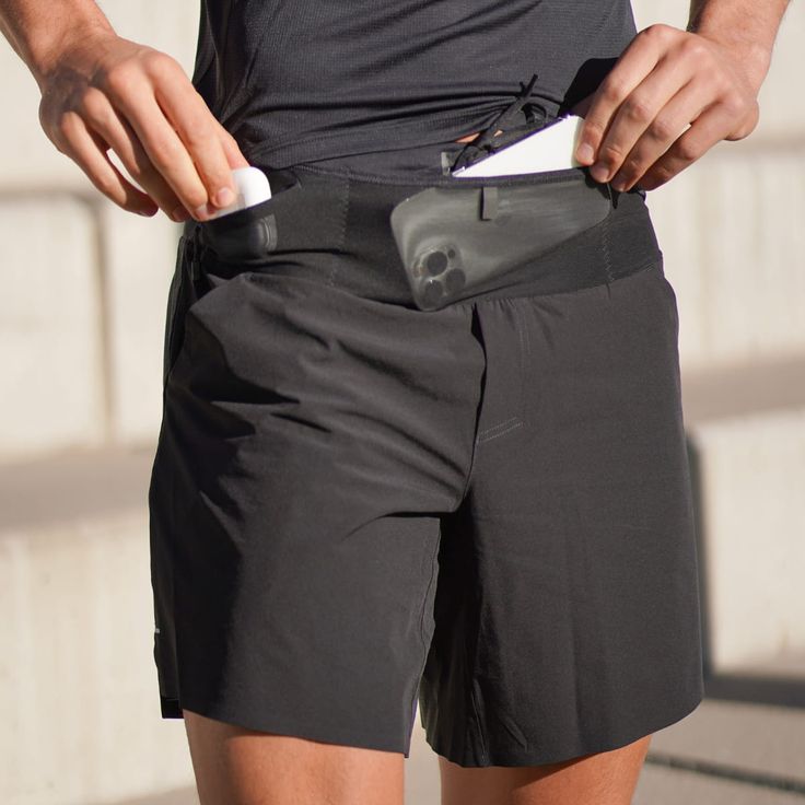 FlipBelt Men's Running Shorts If you're looking for a comfortable, lightweight and stylish men's running shorts with pockets that won't restrict your movement or cause chafing, then look no further. By integrating the FlipBelt Air waistband into high-performance men's racing shorts, your FlipBelt experience just got an upgrade. Enjoy the blend of performance and versatility with the FlipBelt men's lightweight running shorts. Features Moisture wicking Anti-friction and lightweight7" deep pocketsT Running Shorts With Functional Pockets, Functional Running Shorts With Pockets, Functional Sports Shorts With Hip Pockets, Sporty Shorts With Belt Loops, Functional Black Shorts With Hip Pockets, Shorts Reference, Flip Belt, Bodybuilding Workout Plan, Running Shorts Men