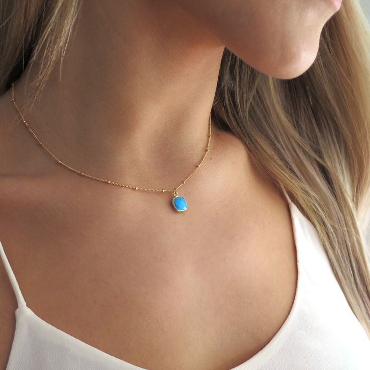 "This dainty little turquoise pendant is faceted and hung on a 14k gold filled chain. It's a perfect gift for any turquoise lover! They make a great layering piece, but also looks perfect by itself! Shop Landon Lacey Jewelry » www.etsy.com/shop/landonlacey it's in the DETAILS . . . » 14k gold filled chain » Turquoise, 9x9mm » Spring ring clasp it's in the OPTIONS . . . » Select your length at checkout. The model is wearing this necklace at 16\", she is petite and this may sit shorter or longer d Dainty Turquoise Necklace For Gift, Dainty Turquoise Pendant Necklace, Dainty Turquoise Charm Necklace For Gift, Dainty Yellow Gold Turquoise Necklace For Gift, Dainty Blue Turquoise Pendant Necklace, Blue Turquoise Necklace With Delicate Chain, Dainty Blue Turquoise Necklace As A Gift, Delicate Gold Necklace, Jewelry Delicate