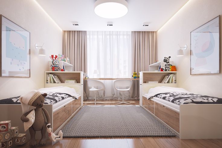 a bedroom with two twin beds and a teddy bear