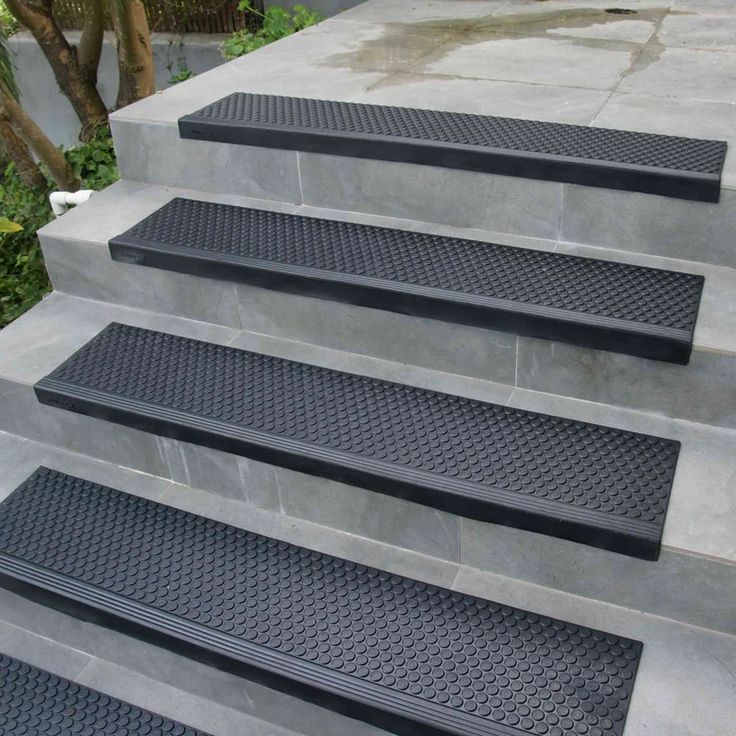 the steps are made of concrete with perfored treads