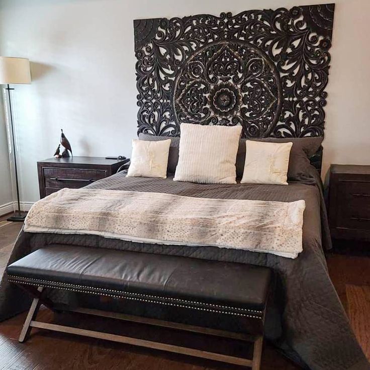 This beautiful dark rustic King size bed headboard will take your decor to the next level. Hand crafted in tropical wood by artists from Chiangmai, Thailand's northernmost province.

Rustic Texas King, 80"W x 66"H x 0.8"D, 25 kg

Acacia wood Consists of 5 16"W panels Easy installation, instructions and hardware included Wood Carved Headboard, Full Bed Headboard, King Size Bed Headboard, Carved Wall Decor, Wall Mounted Headboards, Carved Beds, Carved Headboard, Headboard Queen, Contemporary Bedroom Furniture