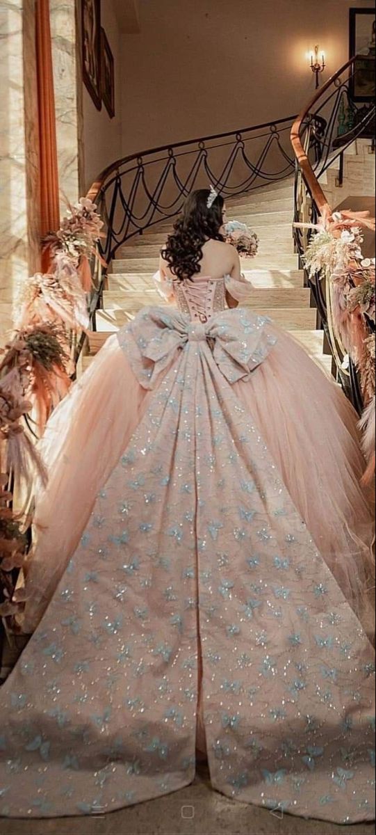 Quince Dresses With Big Bow, Princess Pink Quinceanera Dresses, Quinceanera Dresses With Long Train, Long Train Quinceanera Dresses, Royal Princess Quinceanera Theme, Rose Gold Dress Quinceanera, Quince Dresses Pink And Gold, Spring Quinceanera Dresses, Pastel Pink Quinceanera Dresses