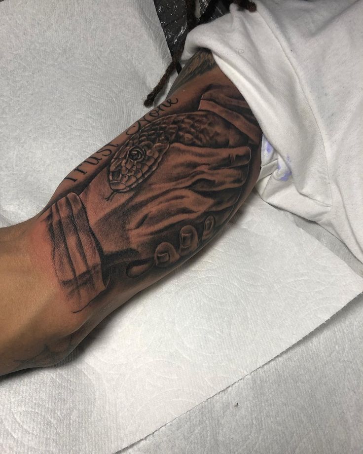 #smoovetattoo #apollomediagroup Trust None Tattoos, Inner Bicep Tattoo Men, Trust None, Arm Tattoos For Guys Forearm, Bicep Tattoo Men, Black Men Tattoos, Half Sleeve Tattoos Forearm, Inner Bicep Tattoo, Nouveau Tattoo