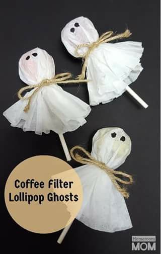 three coffee filterr lollipop ghostes on a stick with the words coffee filterr lollipop ghosts