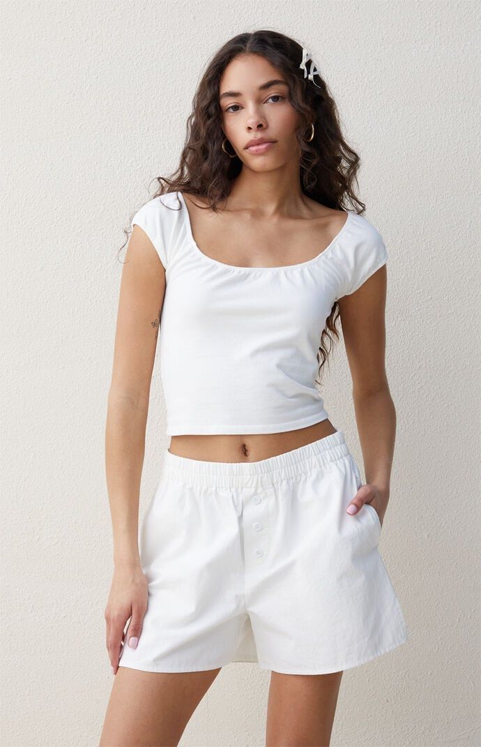 Casual Tops With Built-in Shorts For Daywear, Sporty Cotton Pajama Shorts For Daywear, Basic Cotton Shorts For Summer, Sporty Solid Color Cotton Pajama Shorts, Summer Cotton Tops With Elastic Waistband, Basic White Cotton Shorts, Solid Cotton Pajama Shorts In Athleisure Style, Sporty Cotton Pajama Shorts For Everyday, Fitted Cotton Pajama Shorts With Elastic Waistband