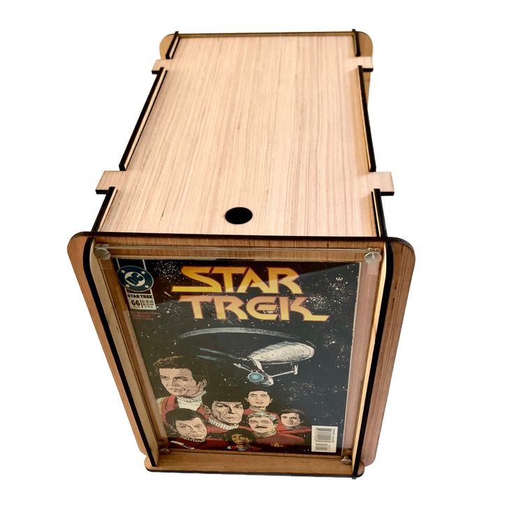 a wooden box with a star trek cover on it's front and bottom sides