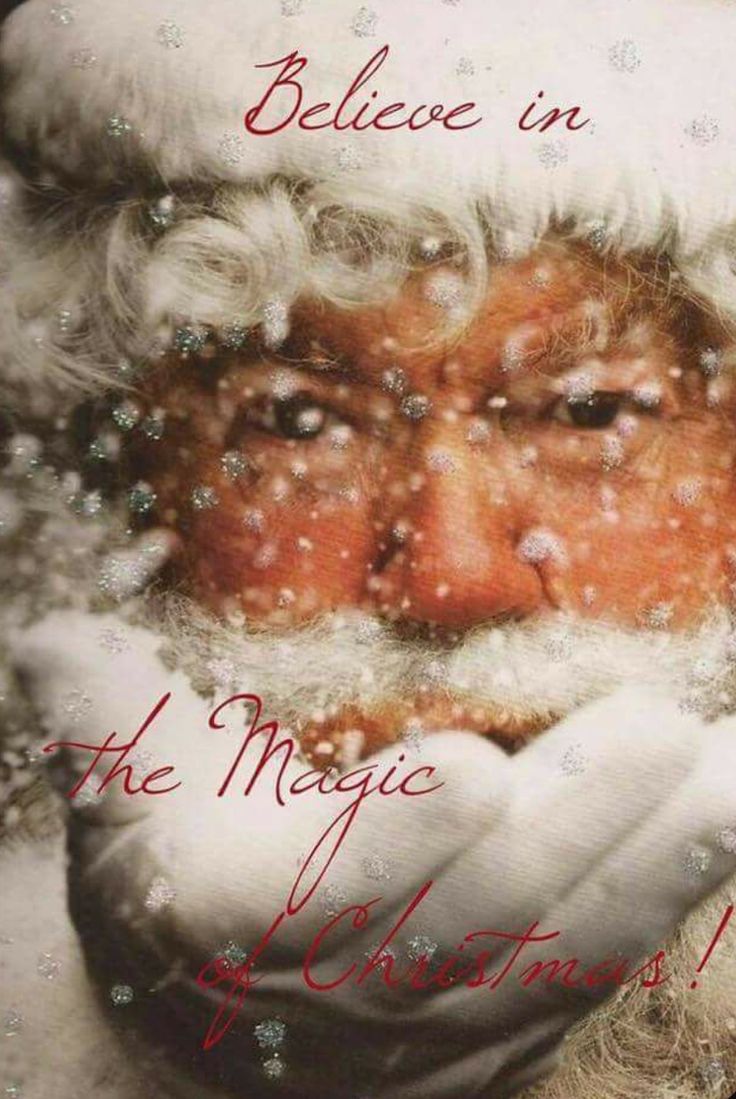 a santa clause holding his face in front of him with the words believe in the magic of christmas