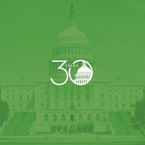 the capitol building is shown in green with white lettering that reads 50 years on it