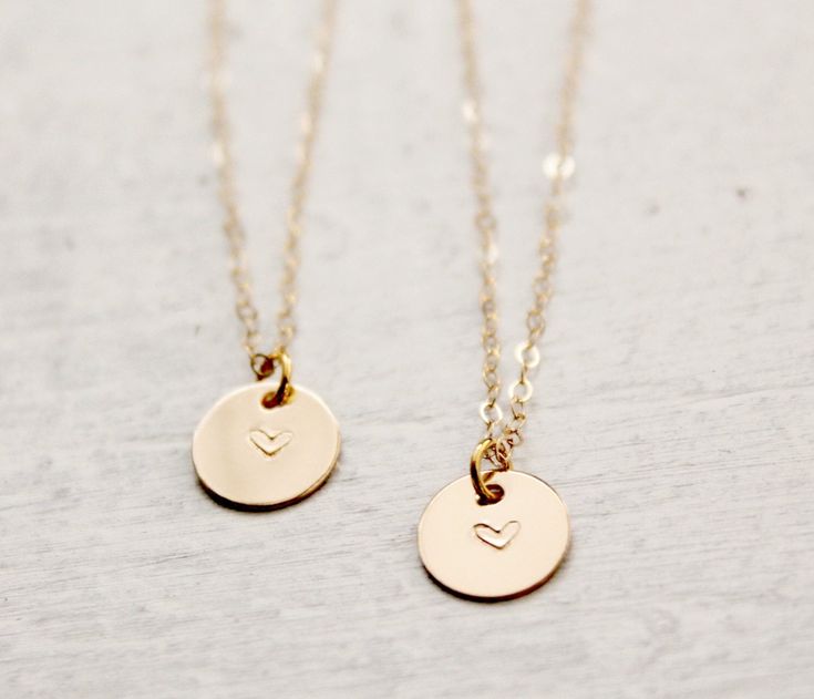 "Best friends Necklace Set, Mom and Daughter necklace set, friendship necklace This lovely set of 2 necklaces features tiny 14k Gold filled discs, (slightly over 3/8\"), hand stamped with a heart. Beautiful lightly brushed finish. Each one hangs from a 16\" or 18\" 14k Gold filled chain. Keep one for yourself and give the other to a loved one. :) Click here to see this set in Sterling Silver: https://www.etsy.com/listing/177999973/sterling-silver-best-friends-necklace?ref=shop_home_active_1" Round Friendship Necklaces For Valentine's Day, Friendship Necklace With Round Pendant For Mother's Day, Friendship Round Pendant Necklace For Mother's Day, Valentine's Day Friendship Necklace With Round Pendant, Round Necklaces For Friendship On Valentine's Day, Round Necklaces For Valentine's Day Friendship, Minimalist Round Pendant Necklace For Friendship, Round Valentine's Day Friendship Necklace, Round Necklace For Best Friend Valentine's Day Gift