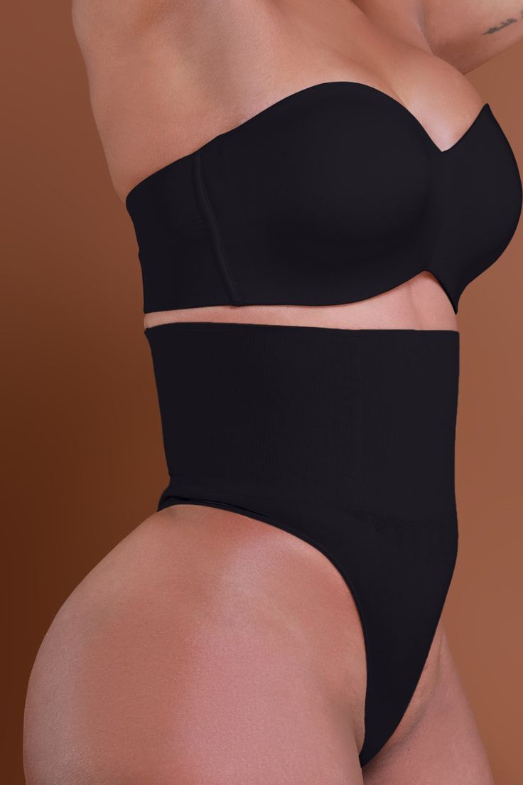 70% Nylon, 30% Spandex | Model Wearing A Size Medium | Fits True To Size | Final Sale Seamless design is virtually invisible Light boning ensures no rolling down Mid-rise cut smooths and shapes and sculpts Thong back for no panty line Double knit waist for extra core compression Style No.148 Sis, we understand that sometimes you need a little extra shaping but you don't feel like it's a full shapewear day. We've got you covered for everyday wear with this ultra comfortable new shaping panty. Thi Black Sleek Shapewear With Built-in Bra, Black Shapewear With Built-in Bra And High-cut Leg, Black High Waist Shapewear With Built-in Bra, Seamless Sculpting No-show Shapewear, Solid Sculpting Shapewear With Seamless Construction, Seamless Shaping Shapewear In Elastane, Seamless Sculpting High-cut Leg Shapewear, Seamless Sculpting Elastane Bottoms, Seamless Sculpting Shapewear In Elastane