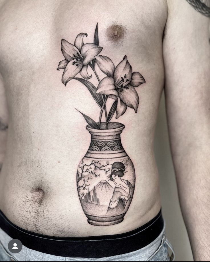 a man's stomach has a vase with flowers in it