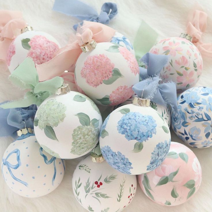 a bunch of ornaments that are sitting on a fur surface